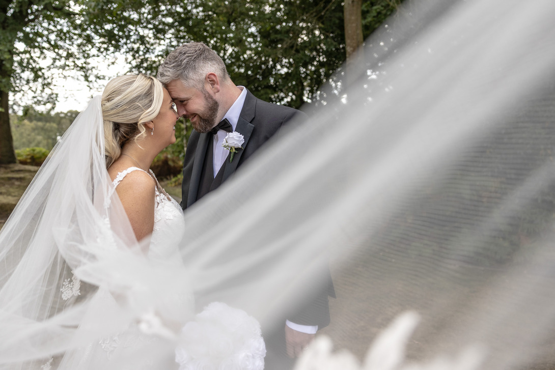 bride & groom celebrating wedding day at nunsmere hall